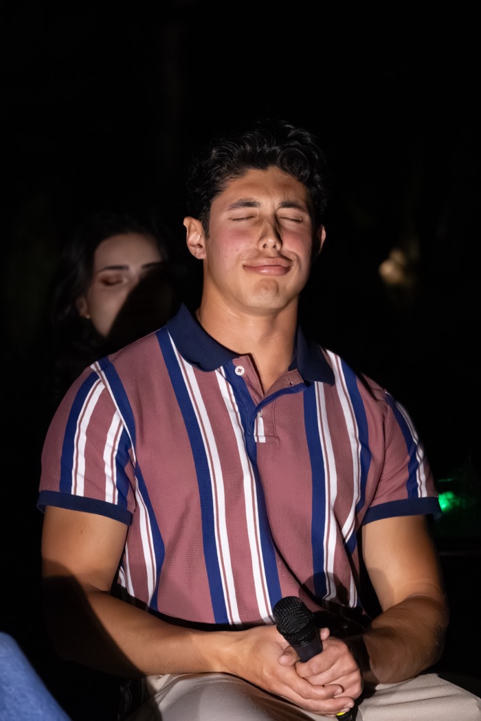 Camilo making a funny reaction face on stage